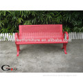 Red metal bench frame outdoor